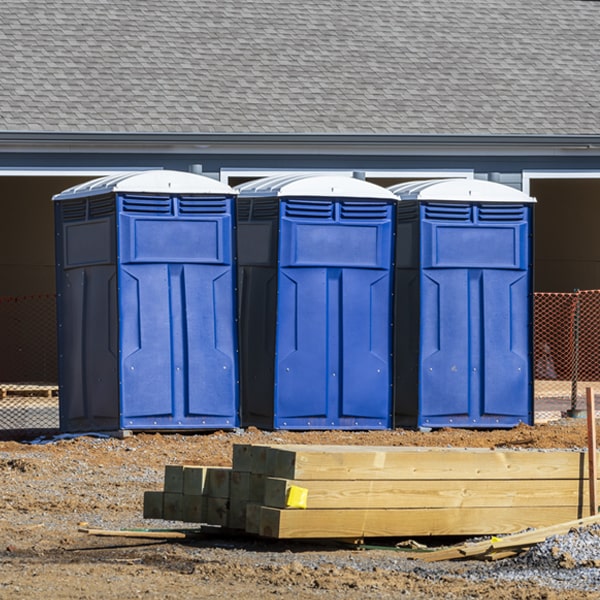 what is the cost difference between standard and deluxe porta potty rentals in Williamstown Missouri
